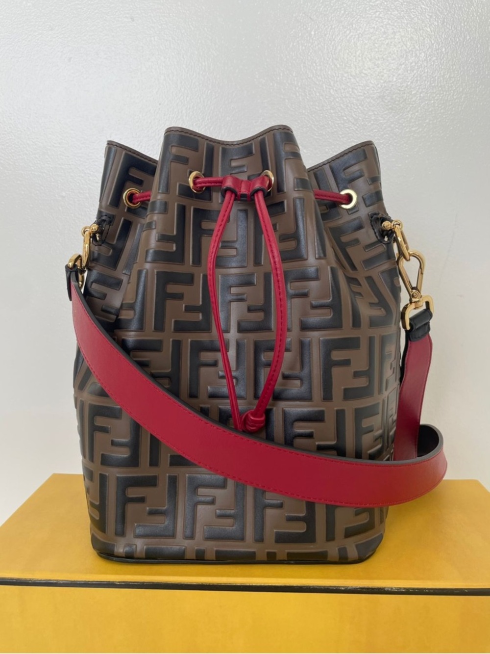 Fendi Brown Logo Bucket Bag with Red Strap